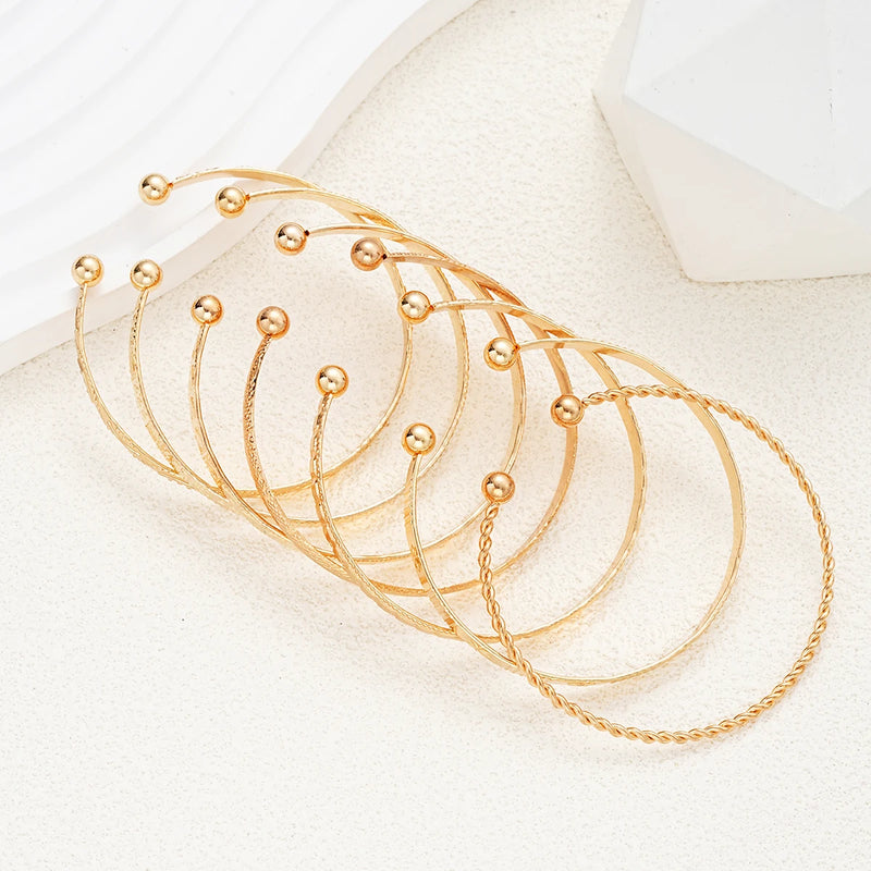 Conjunto de 7 pulseiras punk douradas para mulheres